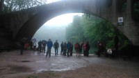 Sheltering from the rain under a bridge