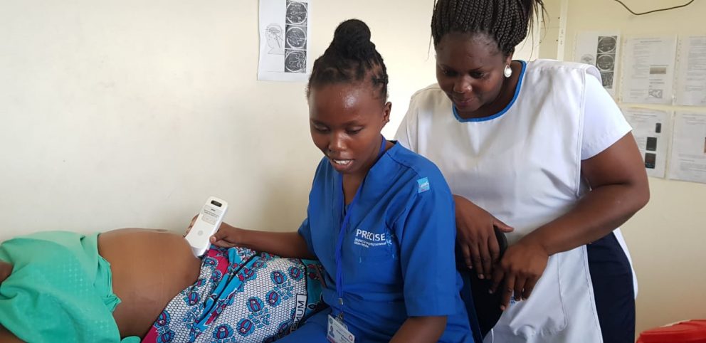 An allied health professional capturing a sonographic video of a foetus.